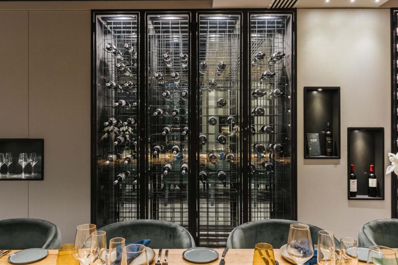 Peppers Waymouth Hotel Adelaide Exterior photo Wine display at the restaurant